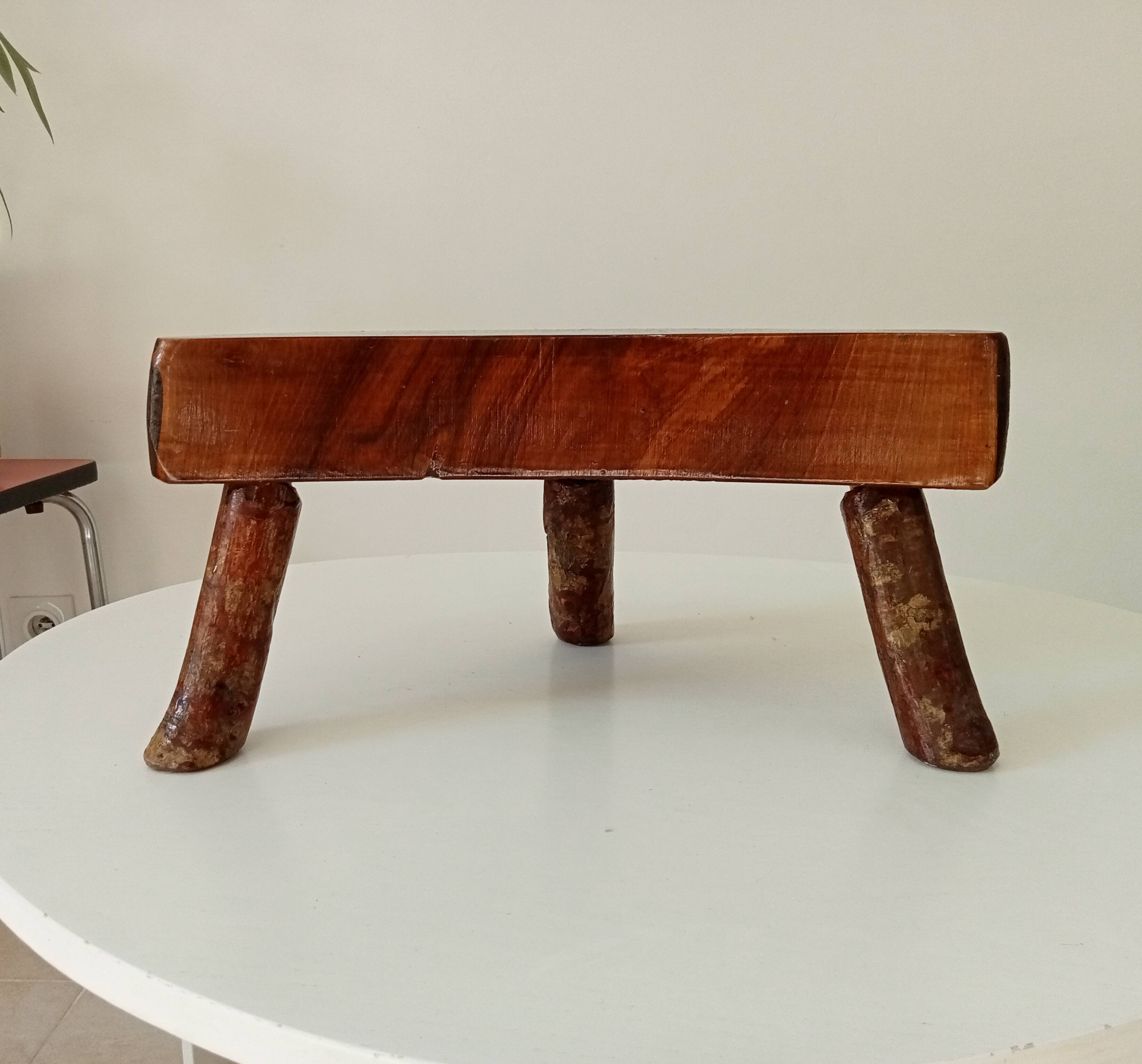 Vintage brutalist tripod stool in solid olive wood