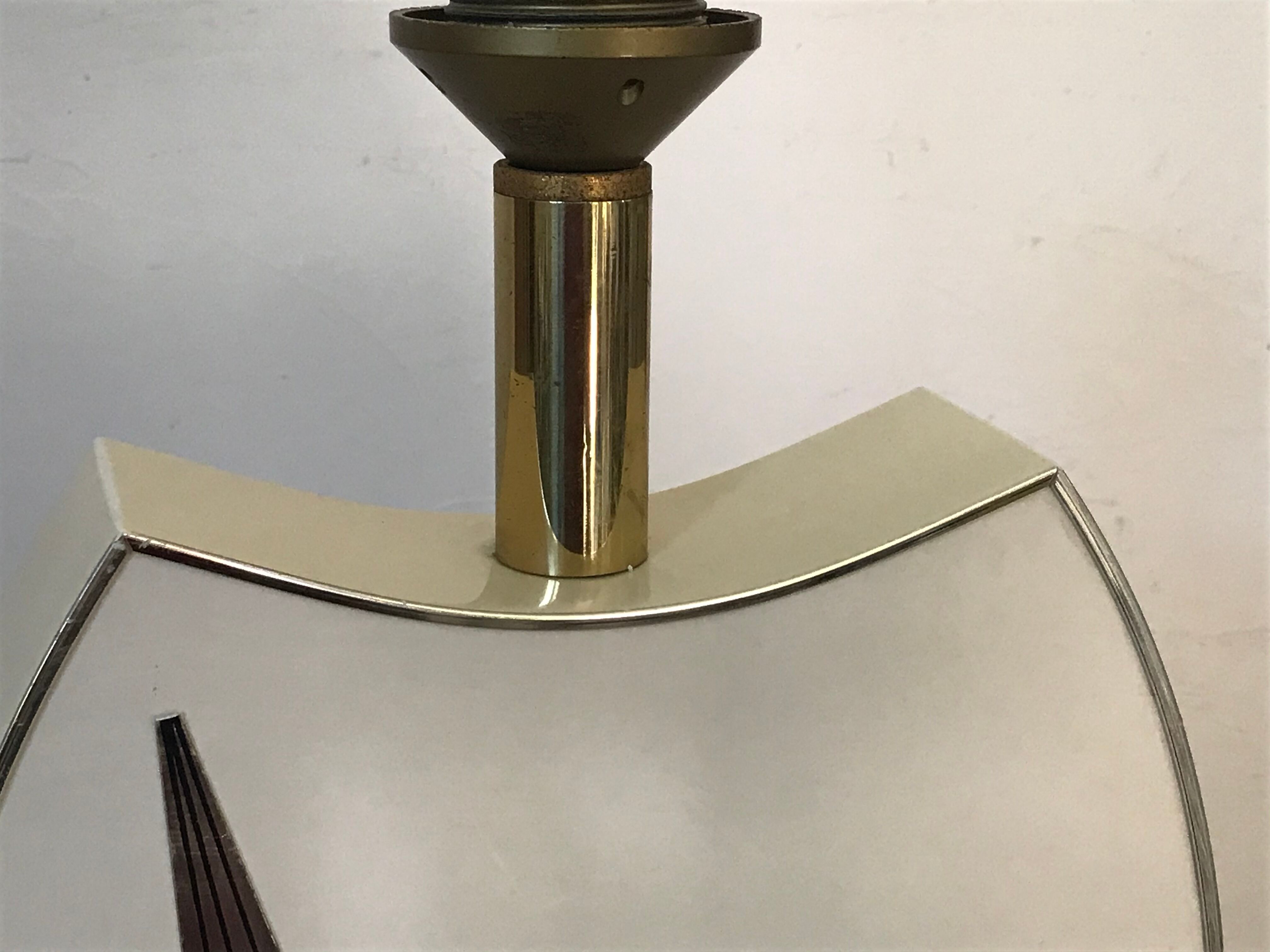 Lace-up and brass lamp