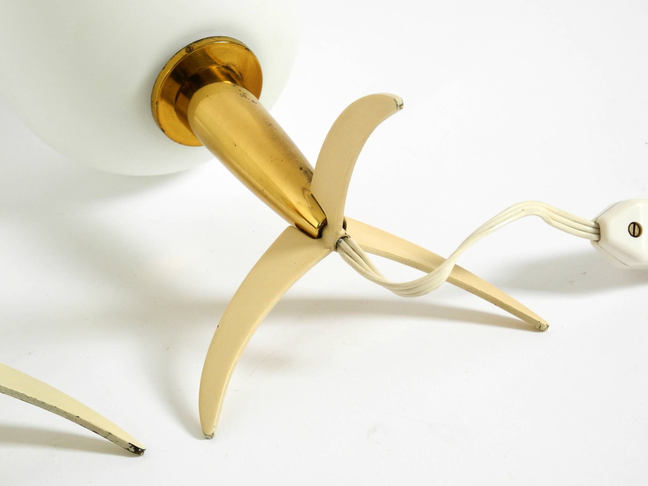 Two Mid-Century Modern rocket table lamps in brass and glass