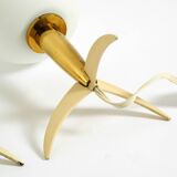 Two Mid-Century Modern rocket table lamps in brass and glass