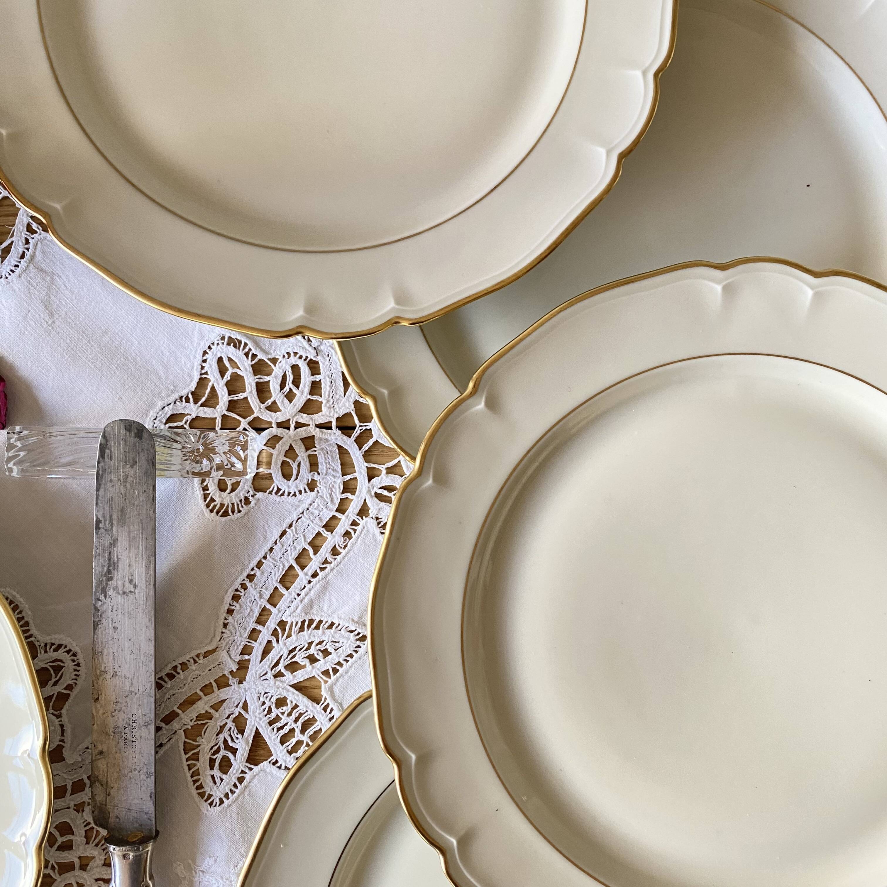 Set of 6 antique off-white porcelain dinner plates with gold trim