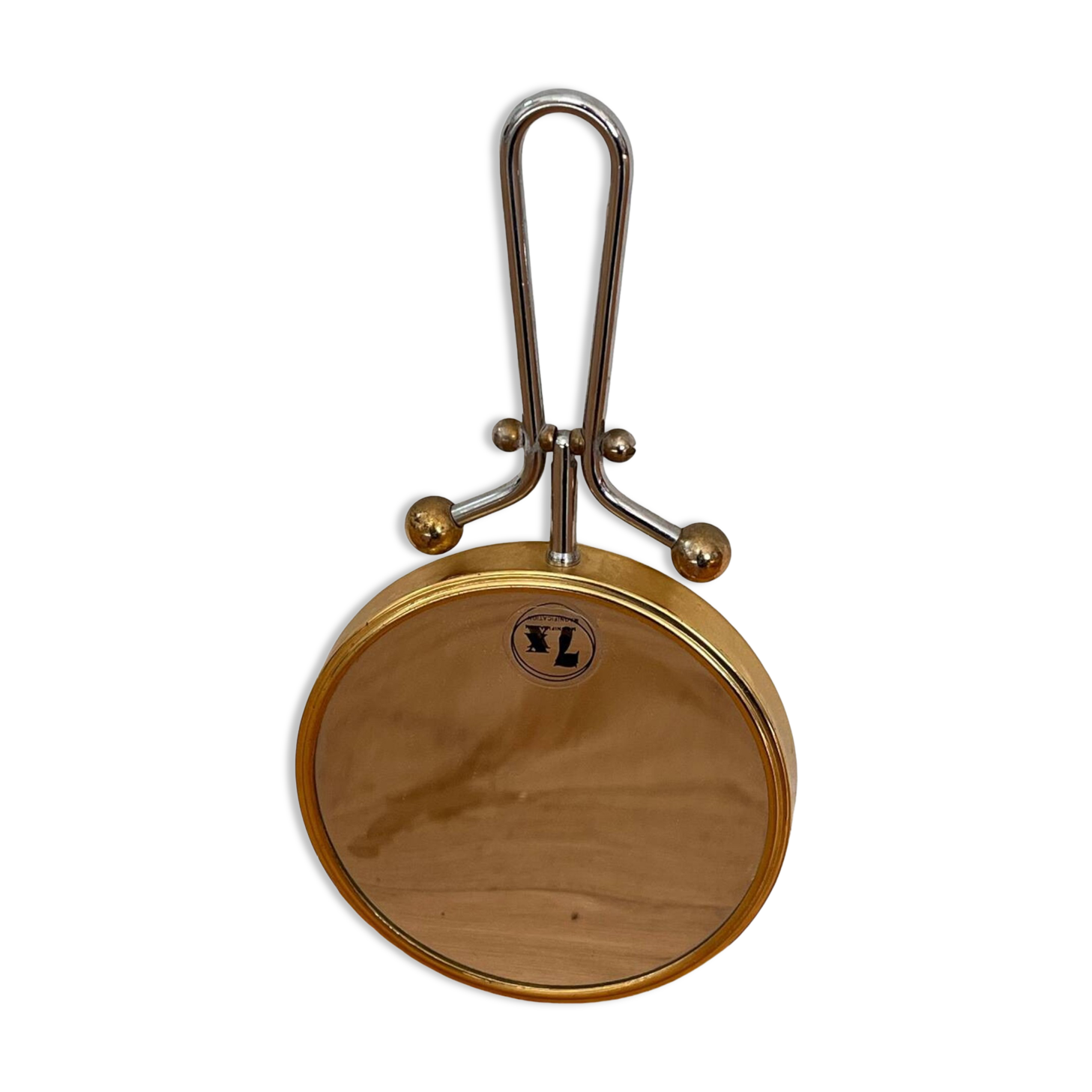 Magnifying brass mirror