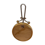 Magnifying brass mirror