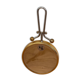 Magnifying brass mirror
