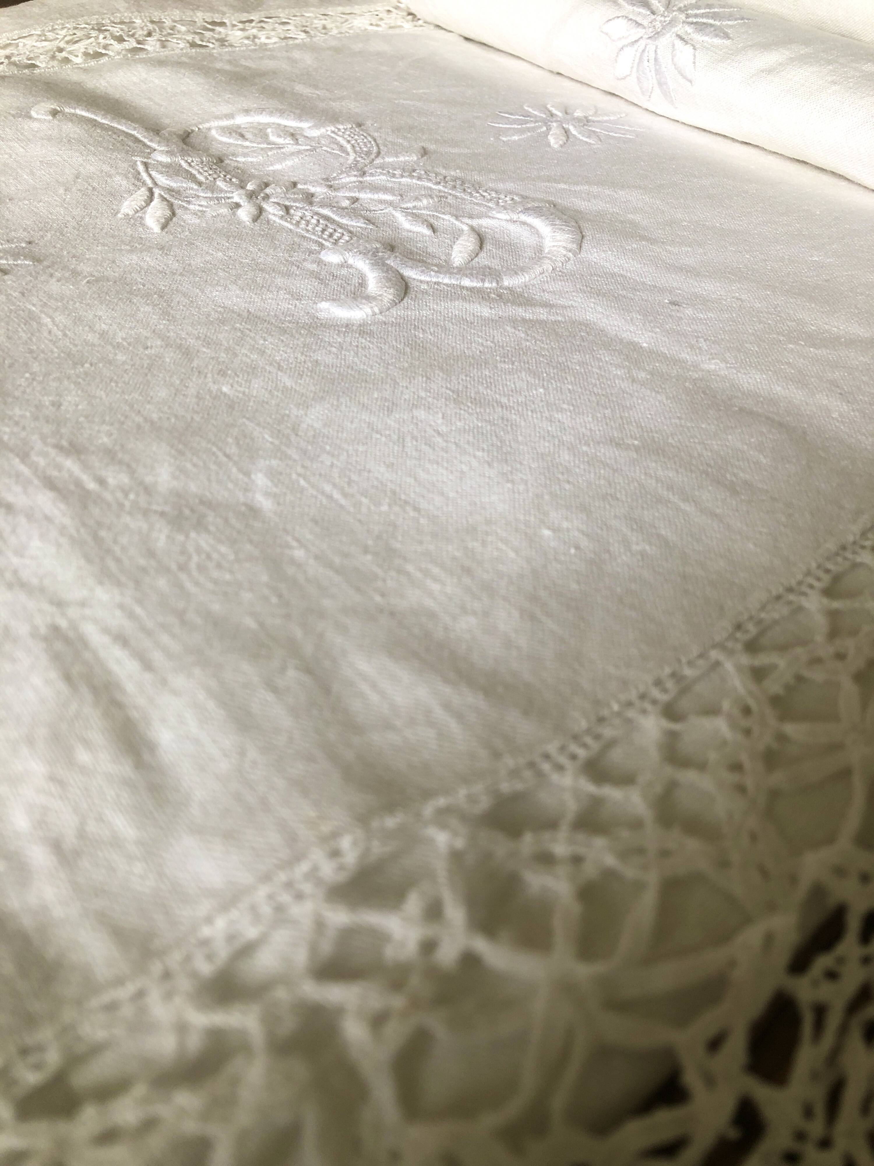 Old embroidered cloth, monograms and lace