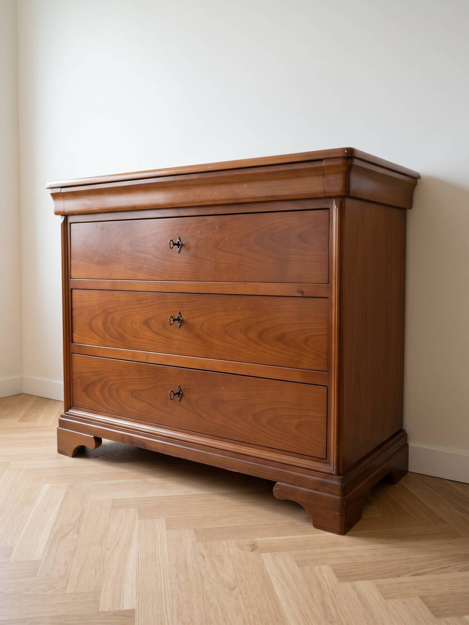 Antique solid wood chest of drawers with a secret drawer.