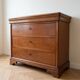 Antique solid wood chest of drawers with a secret drawer.