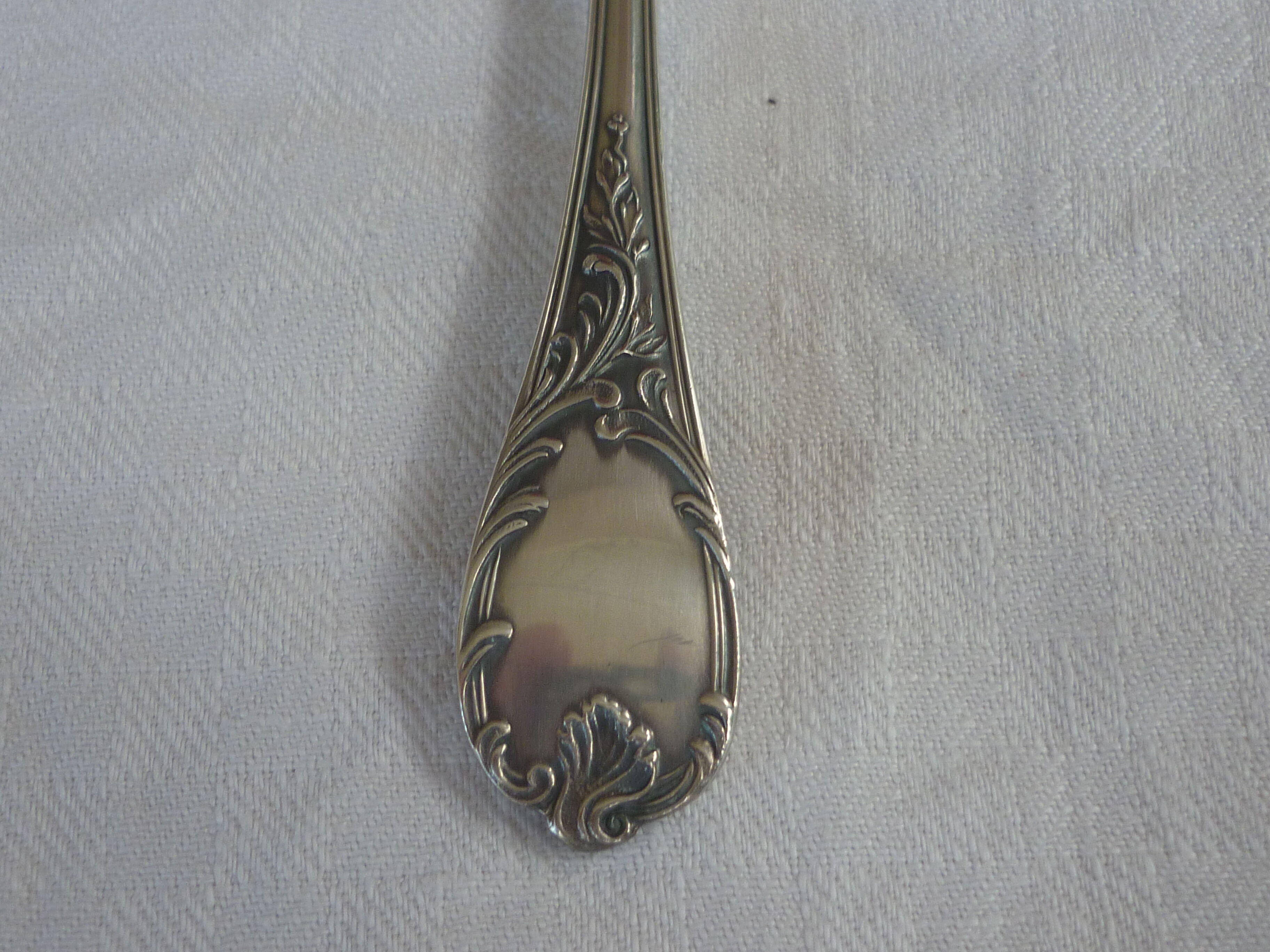 Spoonful with silver metal cubes Christofle