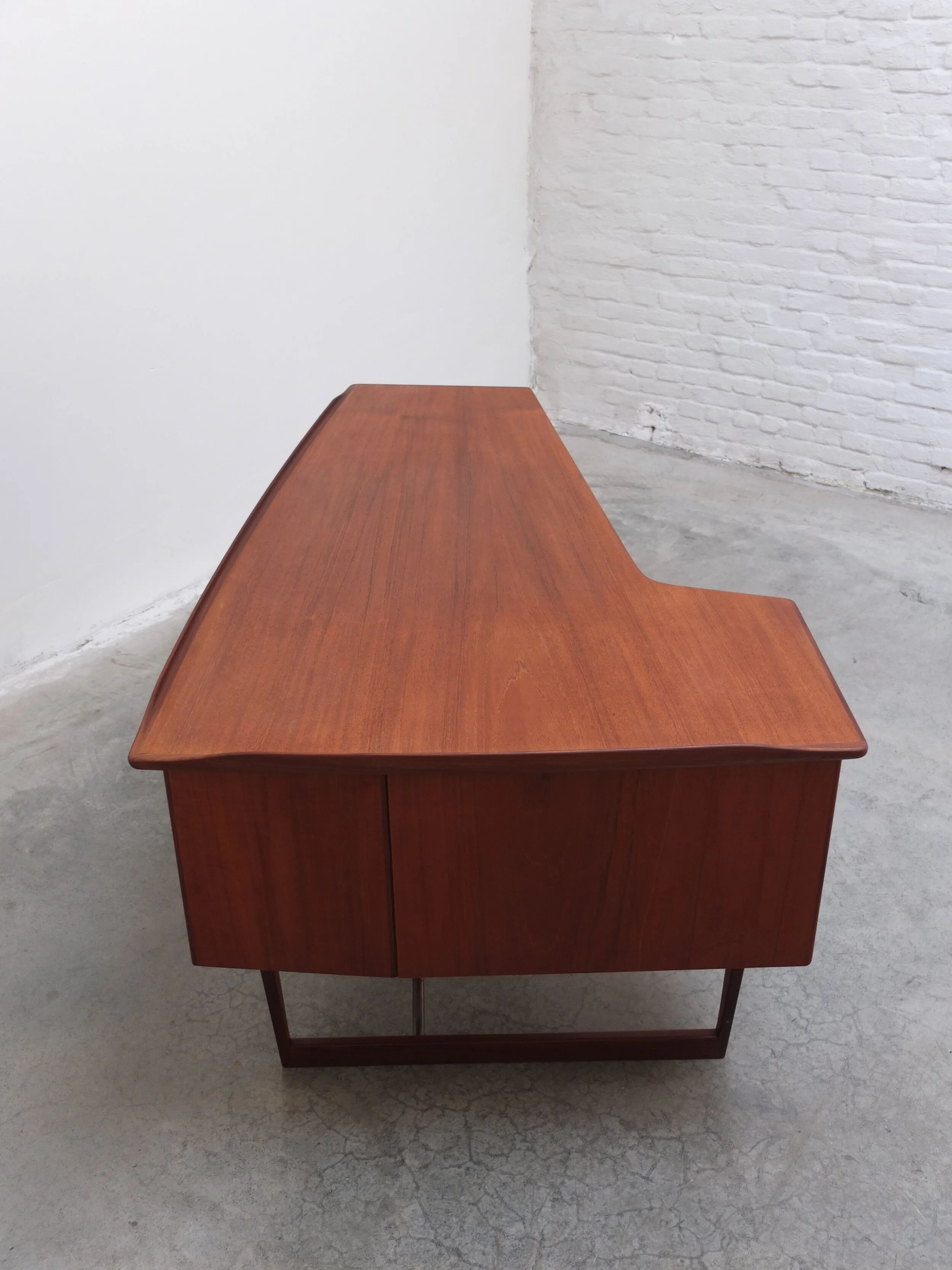 Freestanding 'Boomerang' desk in teak by Peter Løvig Nielsen, 1968