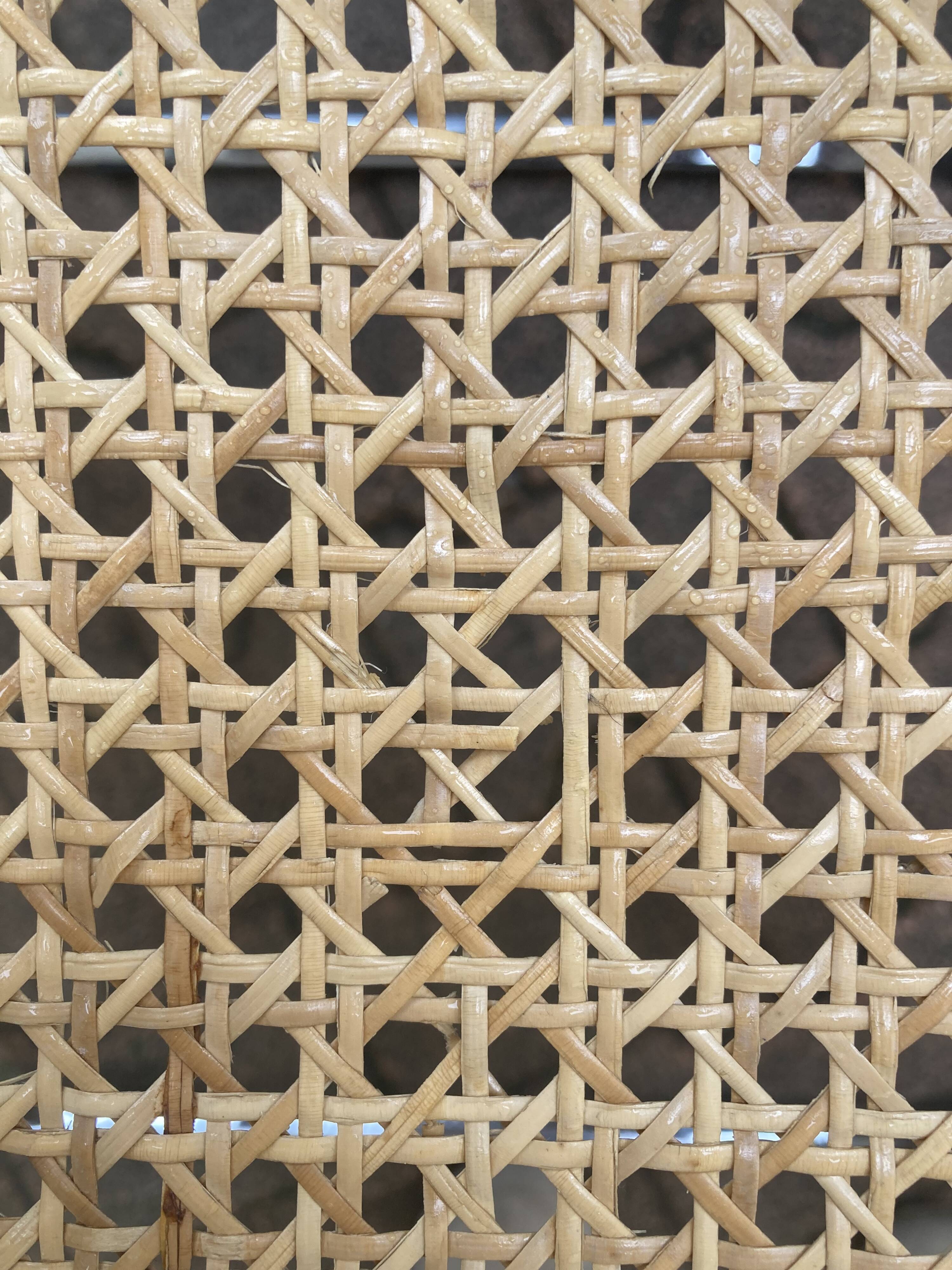 Plia chairs by Castelli in wood and cane.