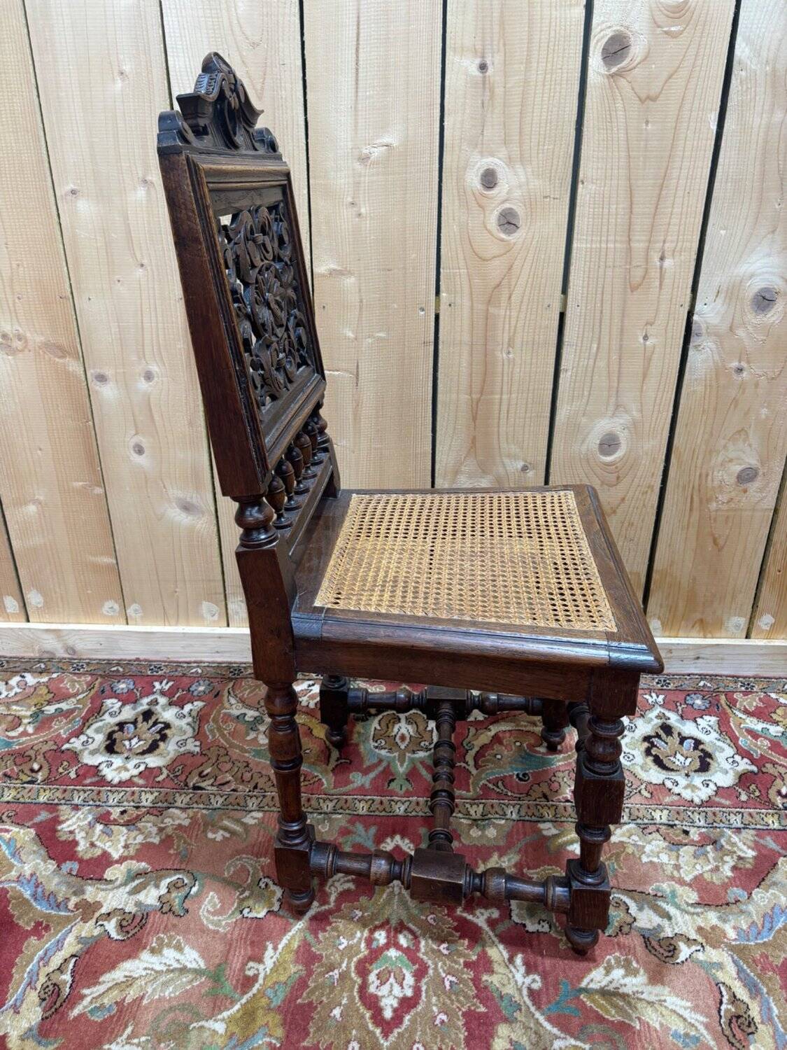 6 High Era chairs in carved solid oak and rattan caning.