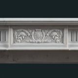 Cheminée en marbre statuaire de style Louis XVI