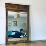 Gilded and beveled pier mirror 88x58cm