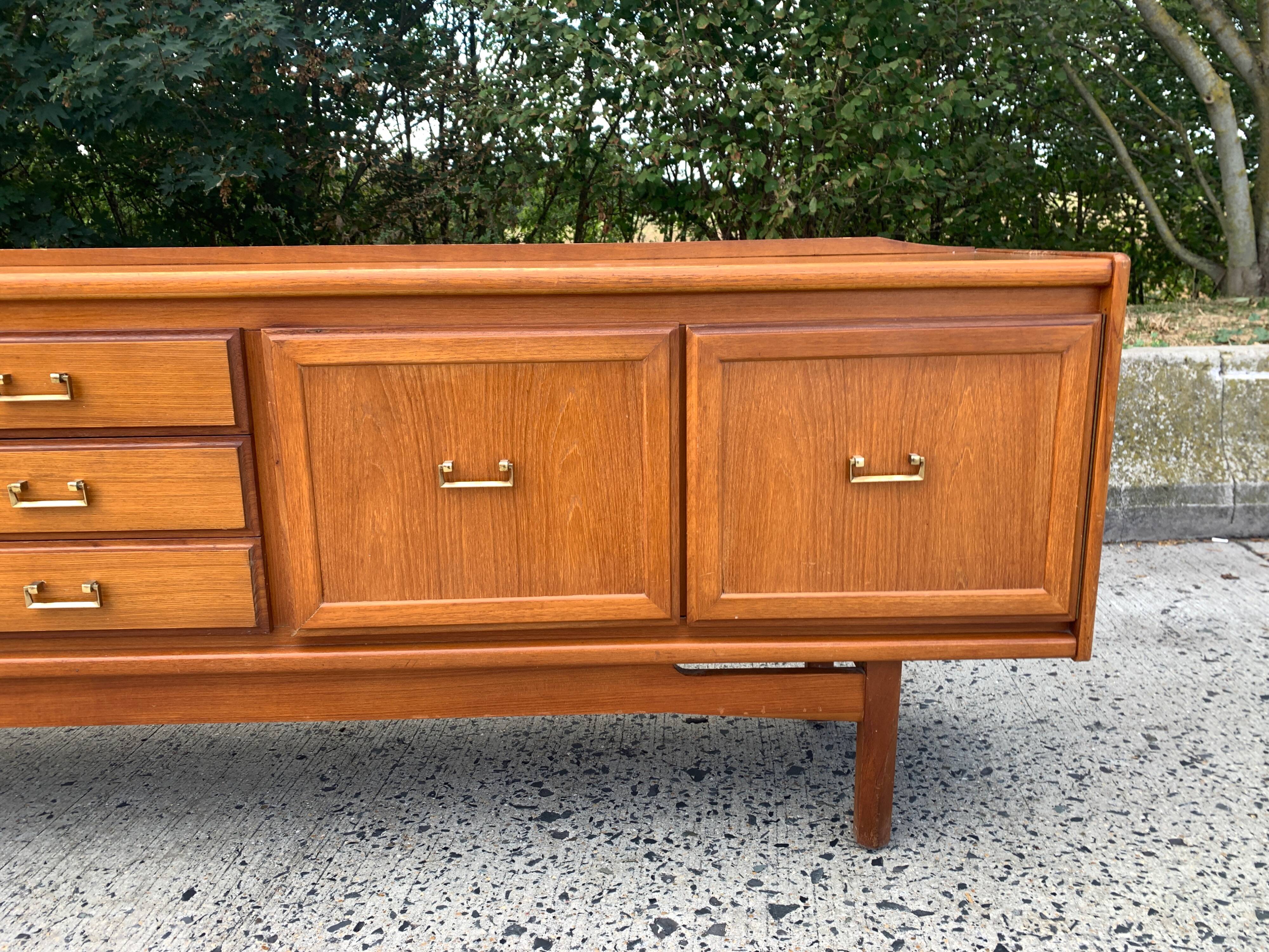 Teak enfilade from the 1970s by the English brand William Laurence.