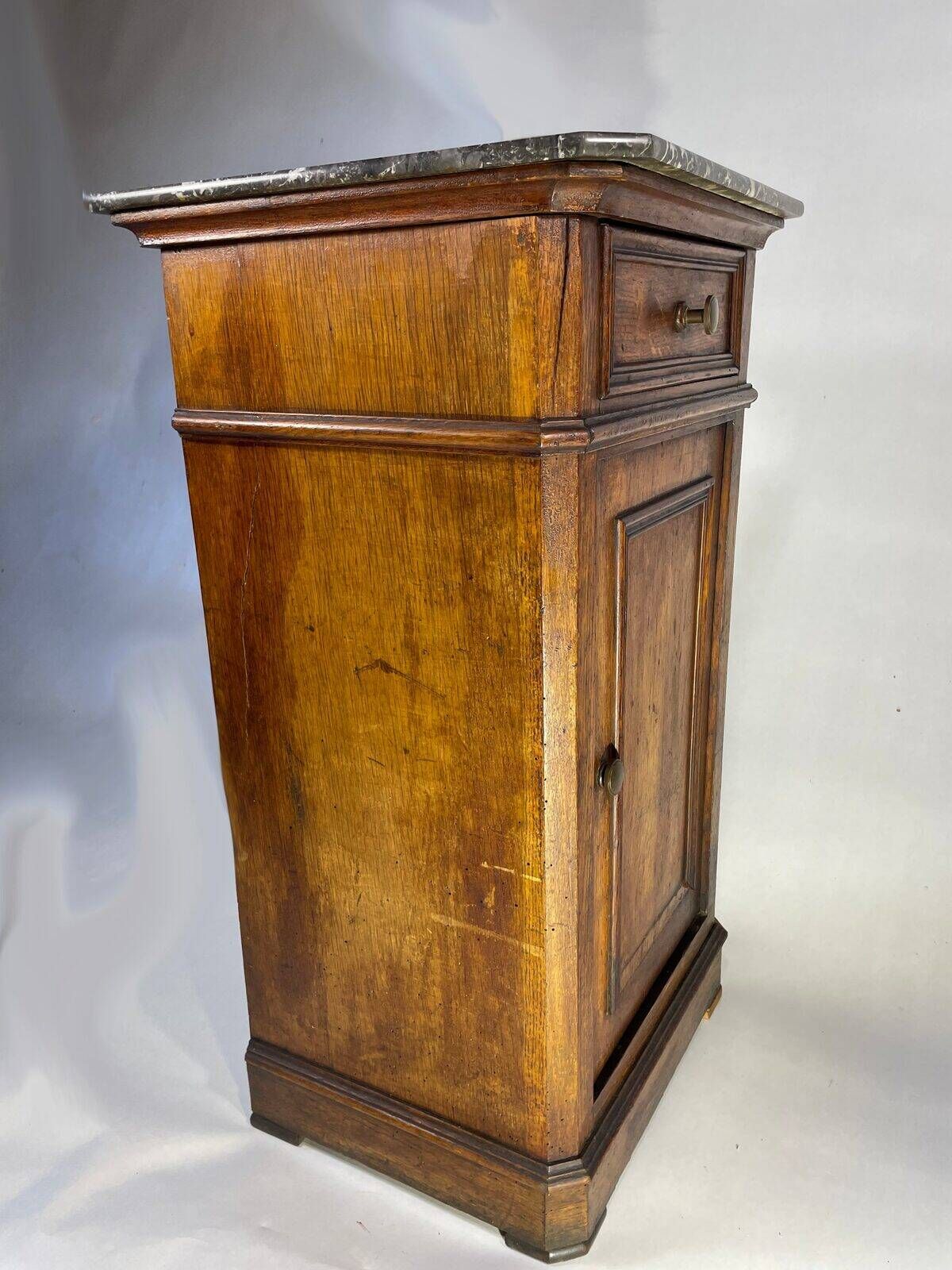 Provincial antique bedside table in oak, marble top, late 19th century.