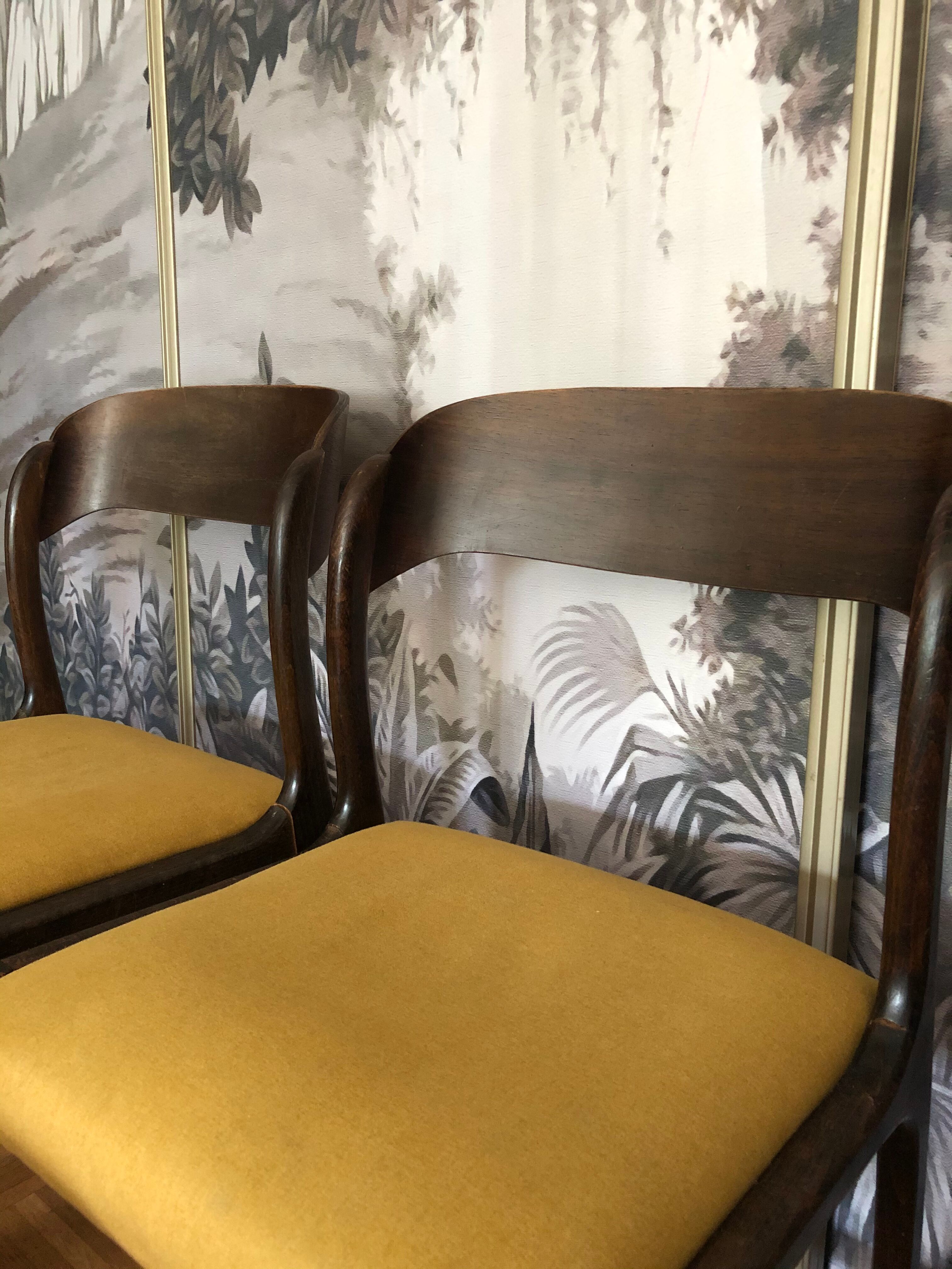 Suite of four Baumann sled chairs