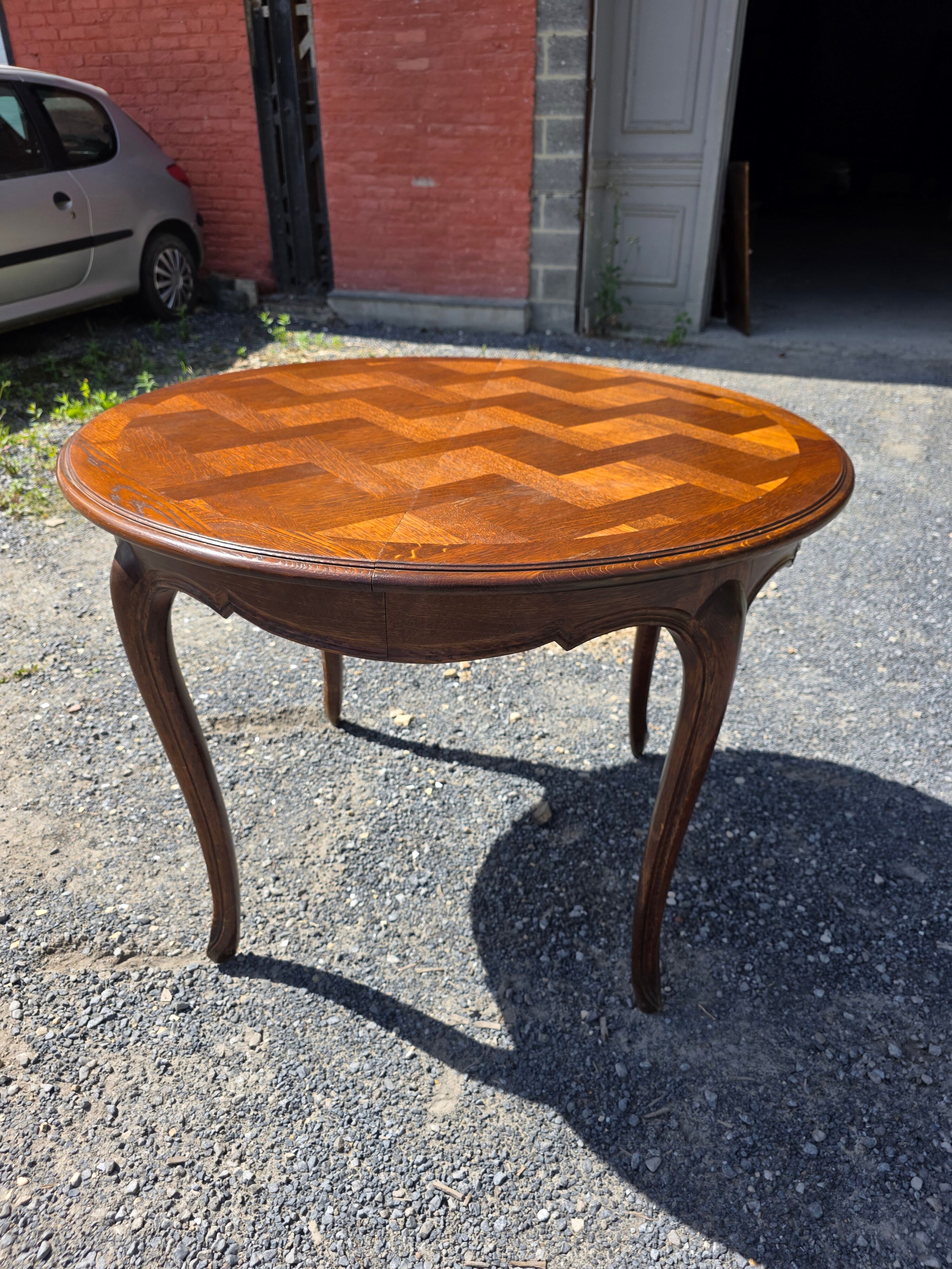 Extendable table in Louis XV style in oak (2 extensions)