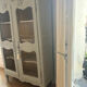 Antique French carved display cabinet with wire mesh doors