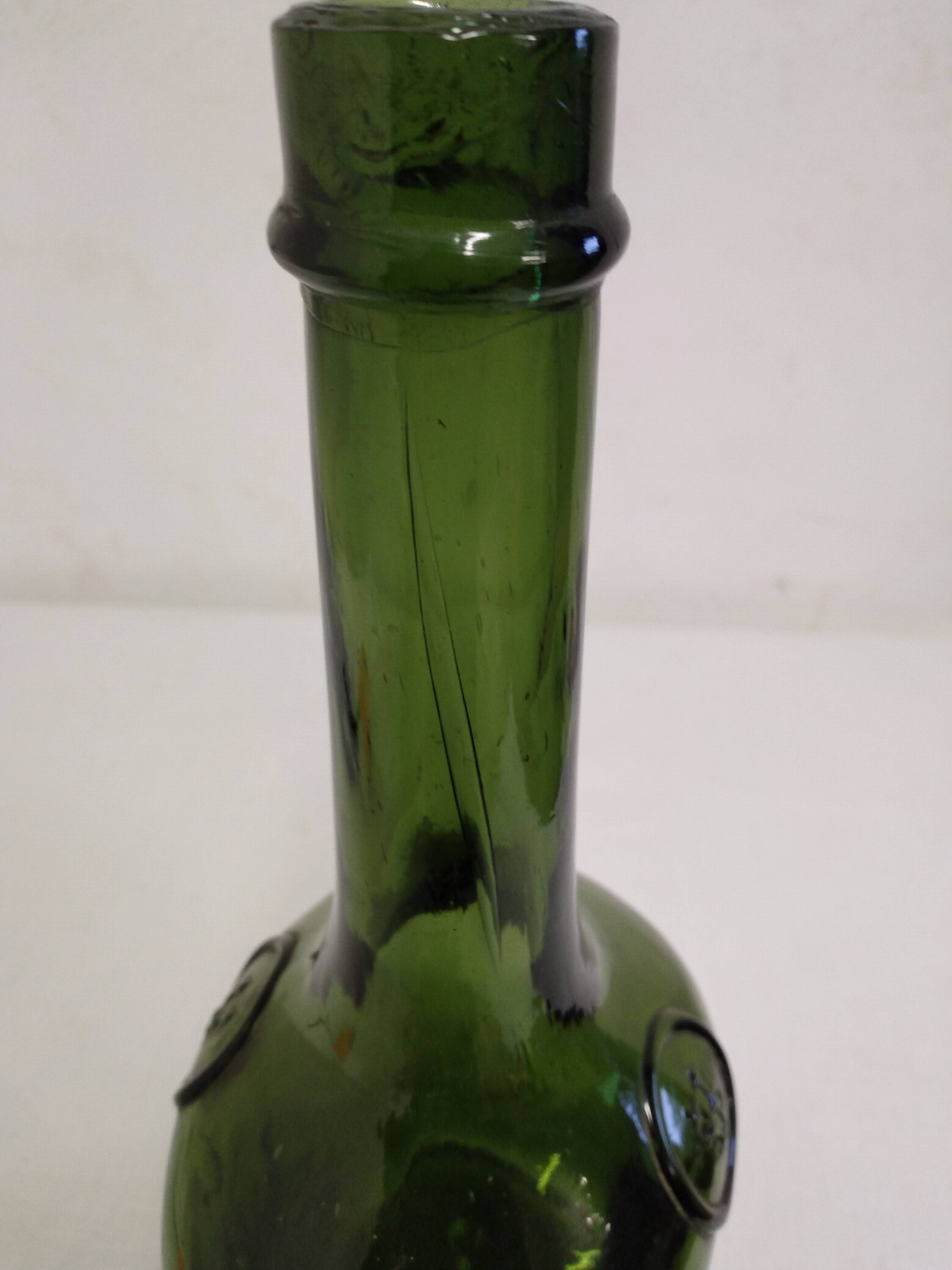 Old blown glass bottle