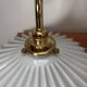 Two wall sconces in serrated white opaline
