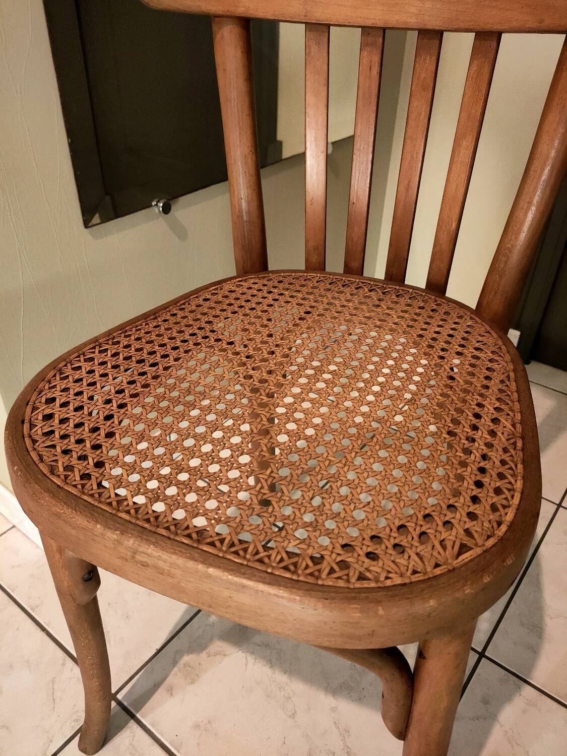 Old bistro chair with caned seat