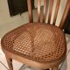 Old bistro chair with caned seat