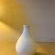 White ceramic with dolphin motif
