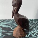 Carved wooden pelican. Dark wood.