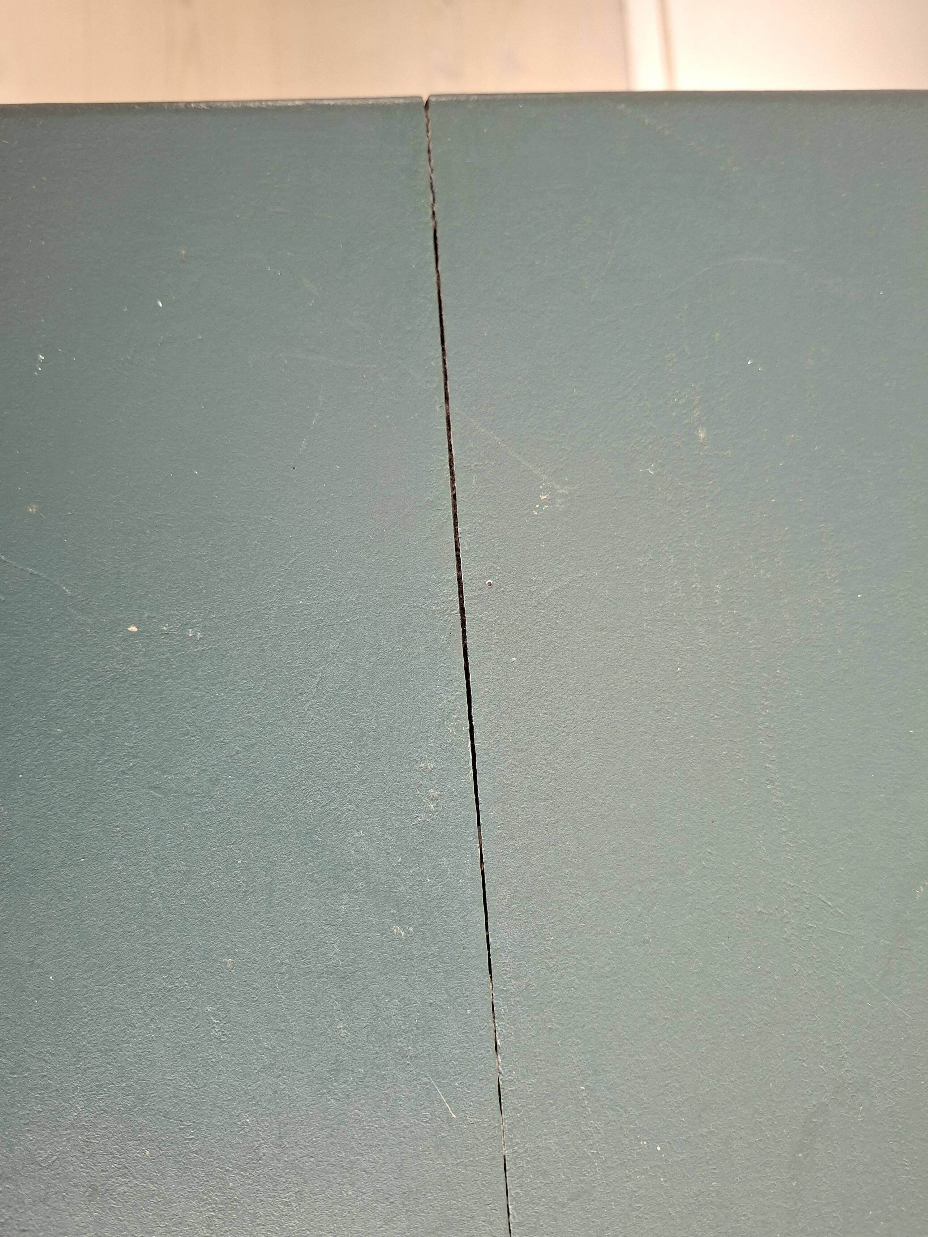 Antique Gustavian-style table painted in dark green with a drawer.