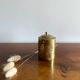 Old round box in chiseled brass