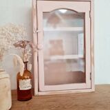 Medicine cabinet in patinated pink wood