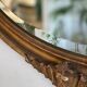 Antique oval gilt mirror.