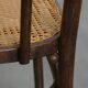 Bistro chair with a woven cane seat