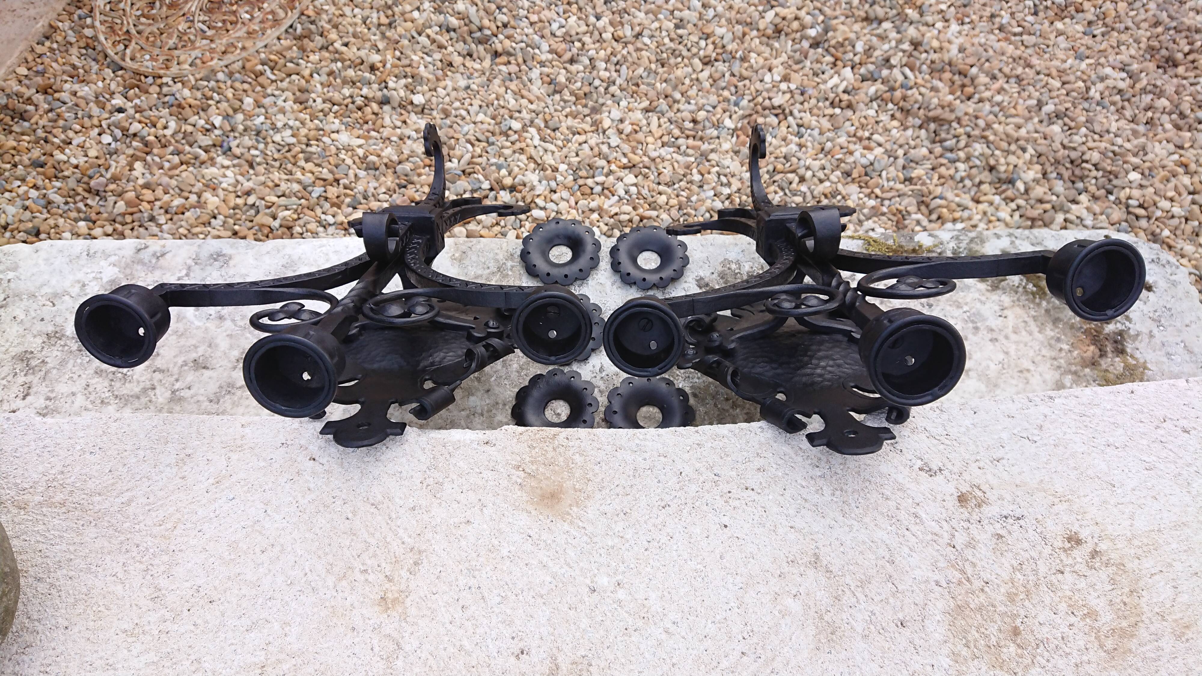 Pair of black wrought iron sconces - neo-Gothic style - from the 1950s