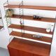 Nisse String shelf in teak, retro vintage style from the 60s-70s.