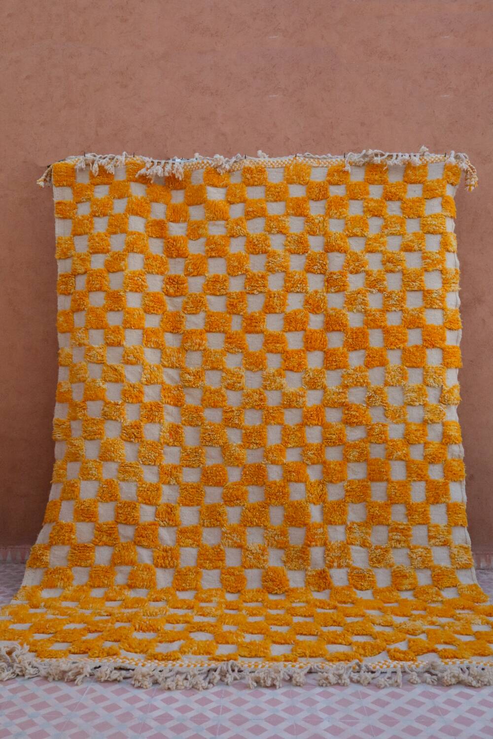 Yellow and white checkered Berber rug