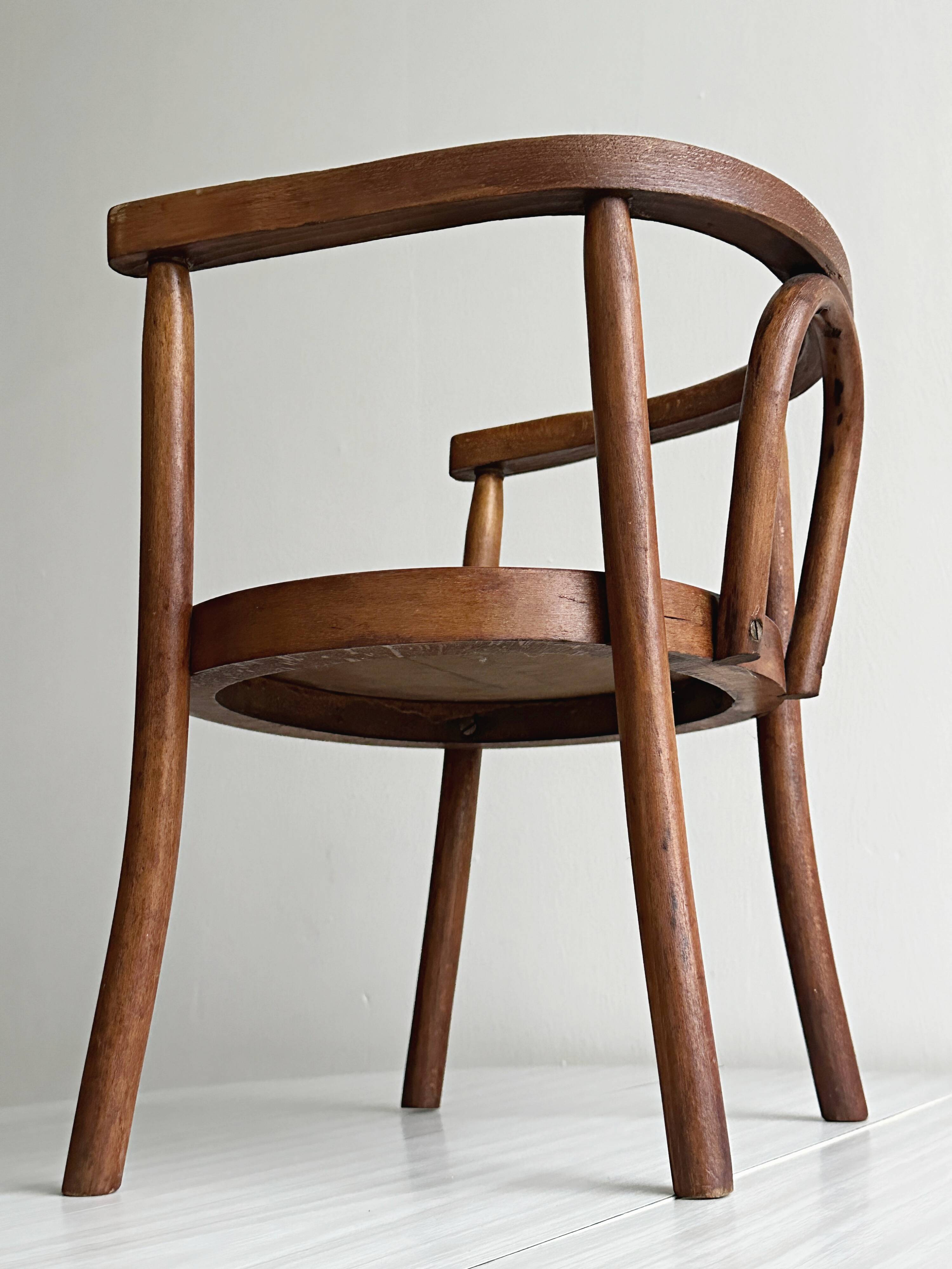 vintage curved wooden children's chair