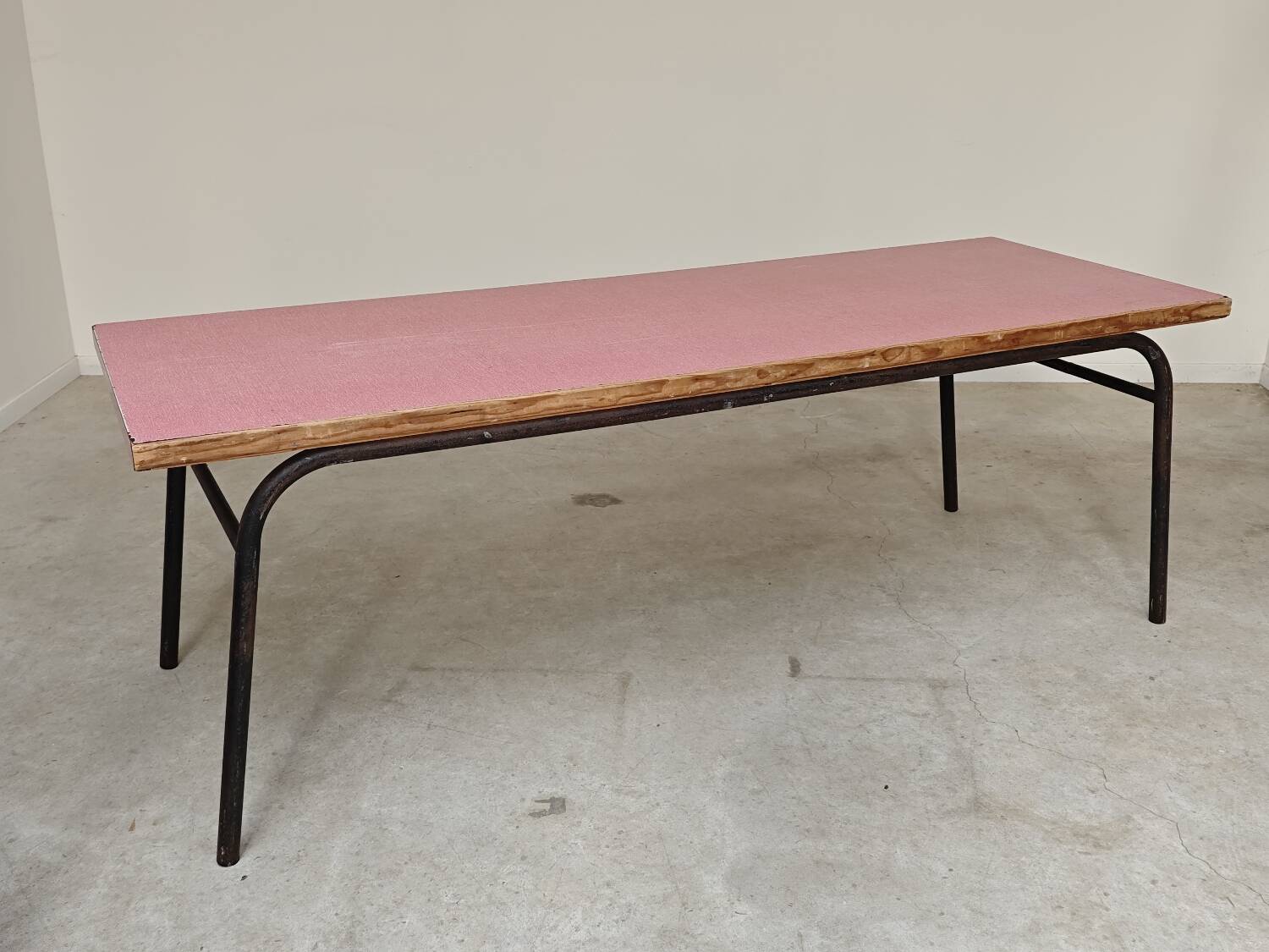 Large canteen table in pink formica and metal.