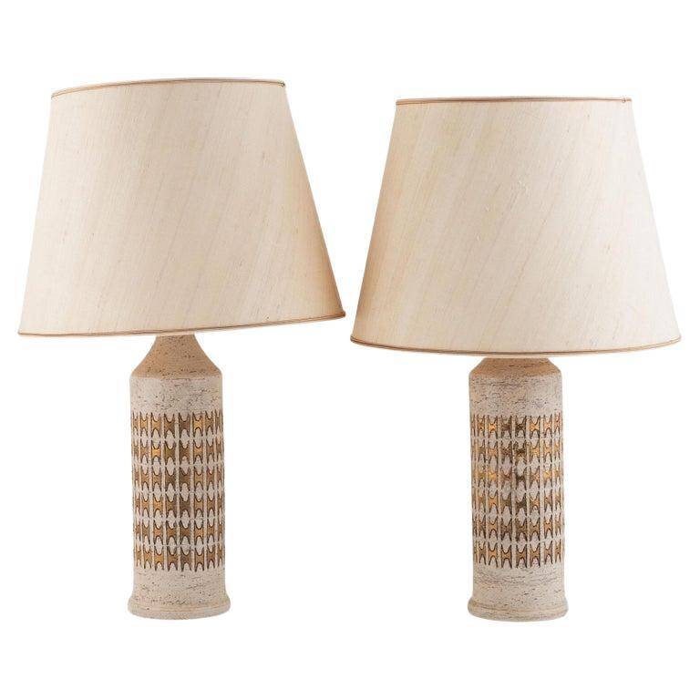 Pair of Bergboms ivory enamelled desk lamps and gilded ceramic Sweden 960
