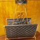 Free-standing ashtray with magazine holder