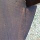 Set of three brutalist tripod armchairs in carved solid oak