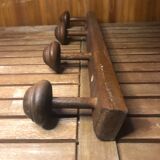 Old coat rack with 4 vintage wooden hooks