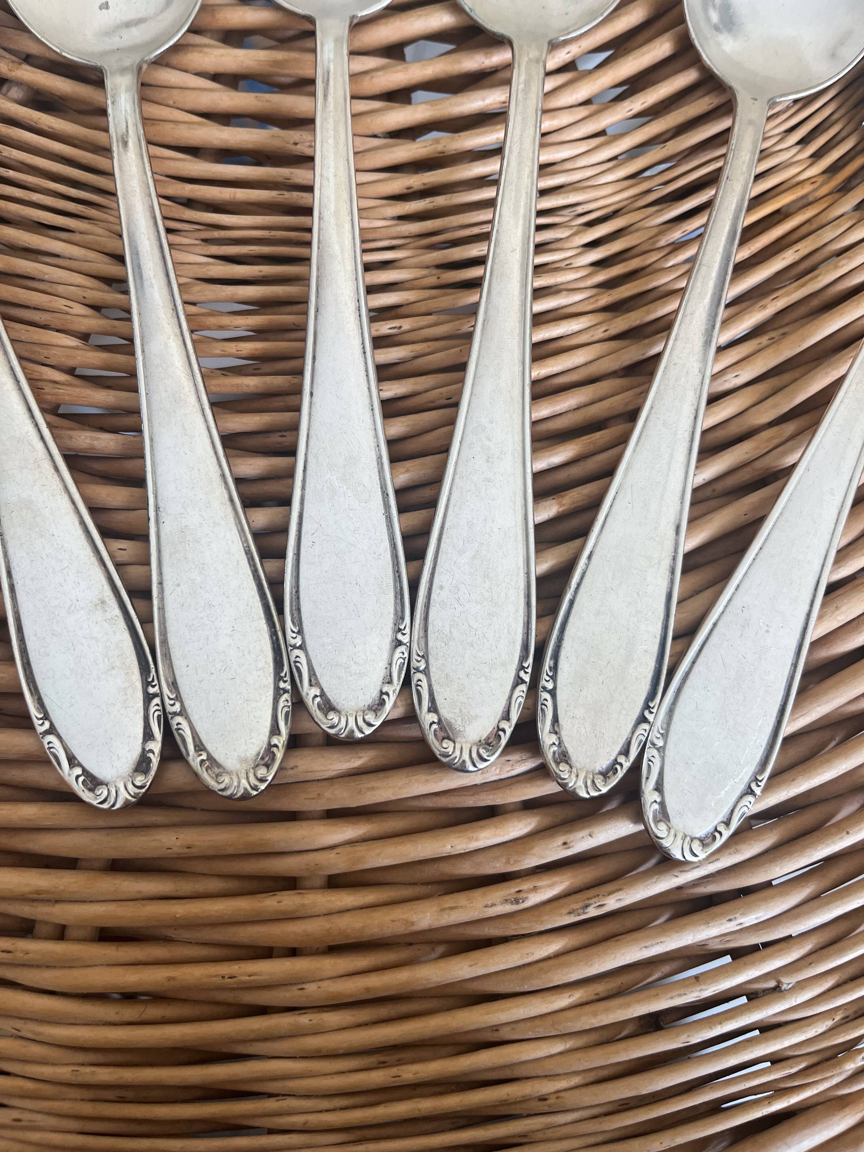 Set of 6 silver metal spoons