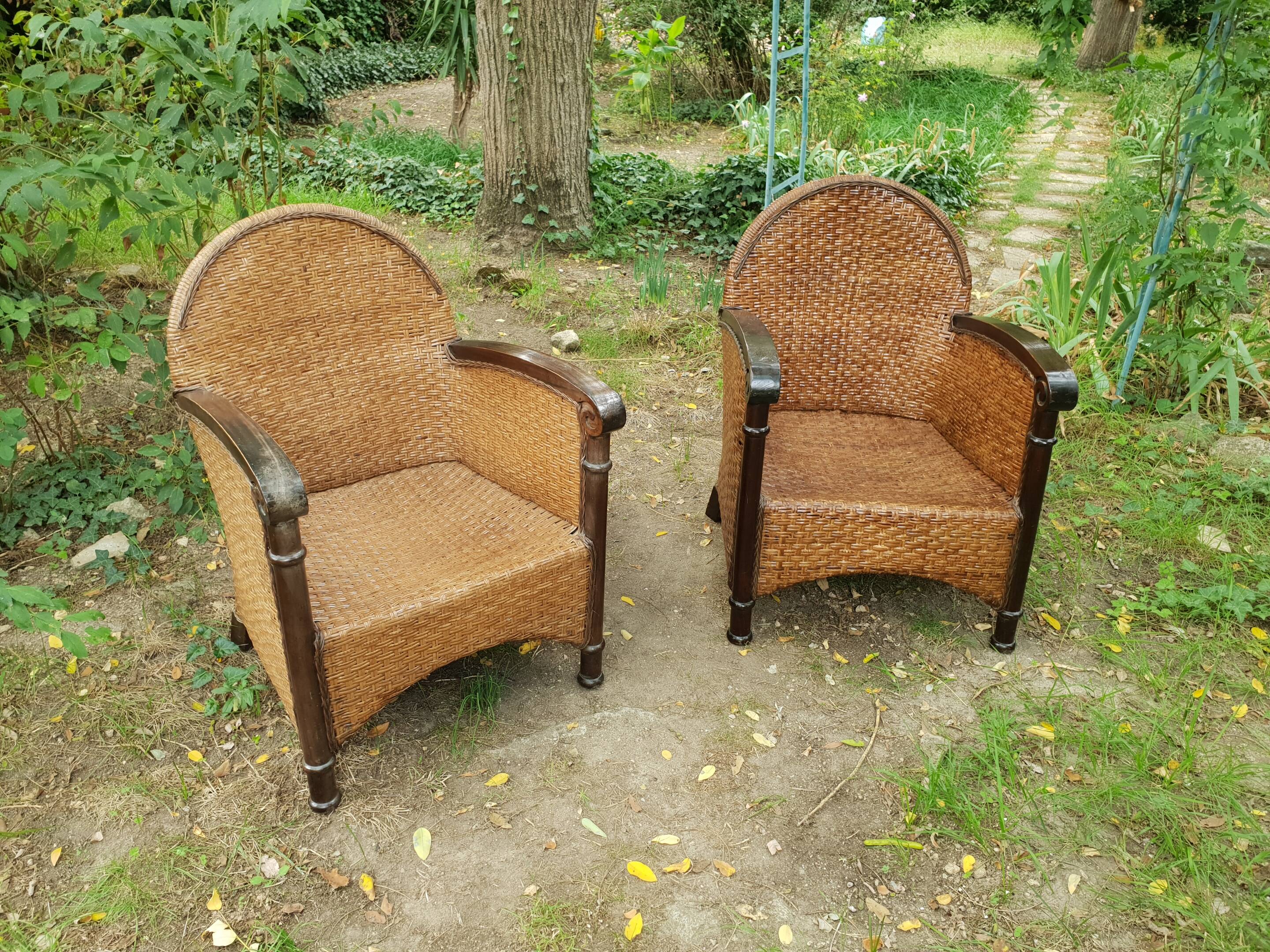 Paire de fauteuils en bois et rotin 1980