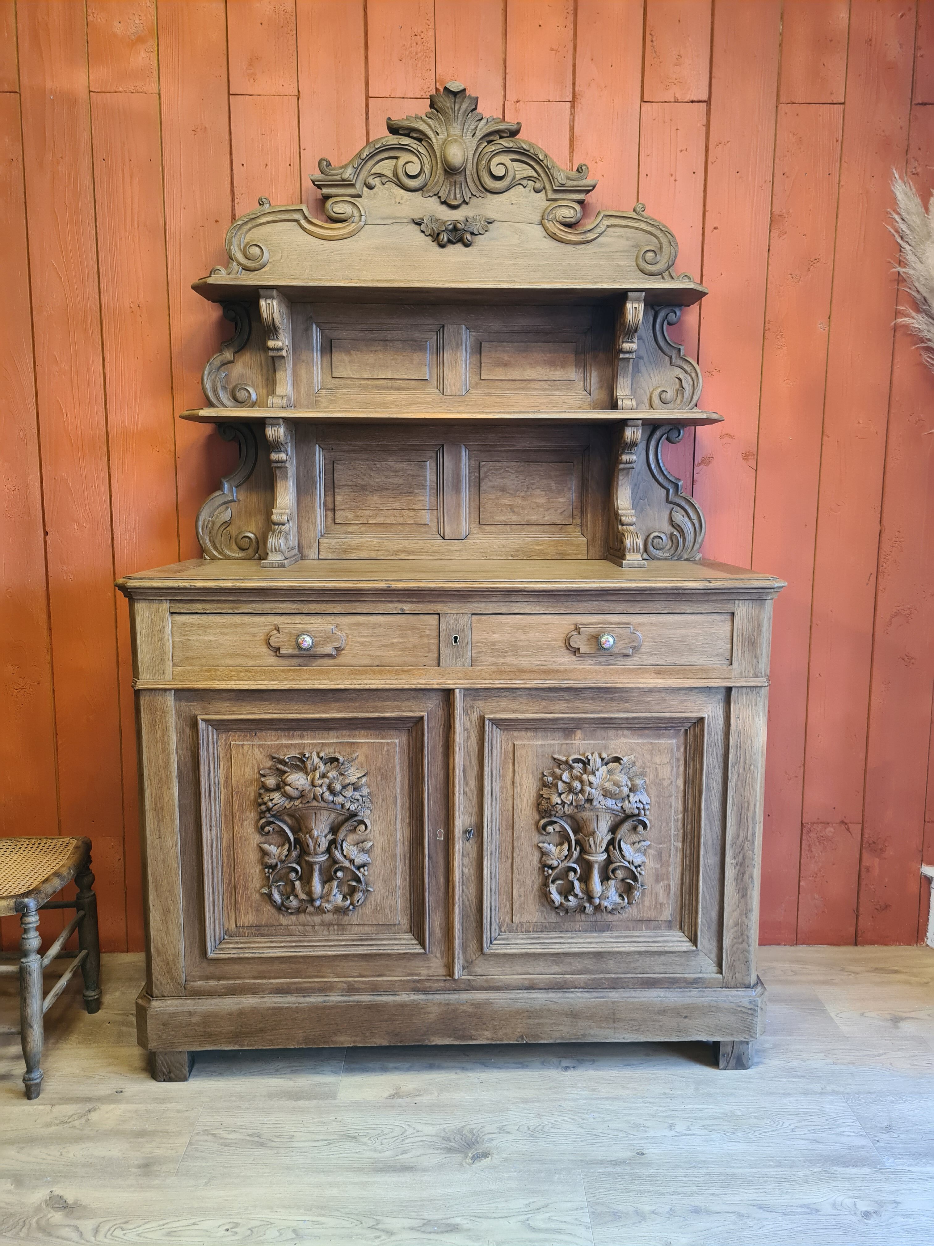 Saint Hubert oak cabinet with sculptures completely renovated