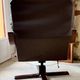 1970s Scandinavian armchair in curved laminated wood with a leather seat.