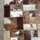 Patchwork carpet in cowhide 164x105cm from the 70s