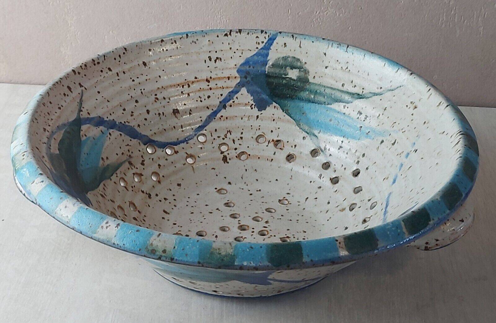 Old stoneware colander