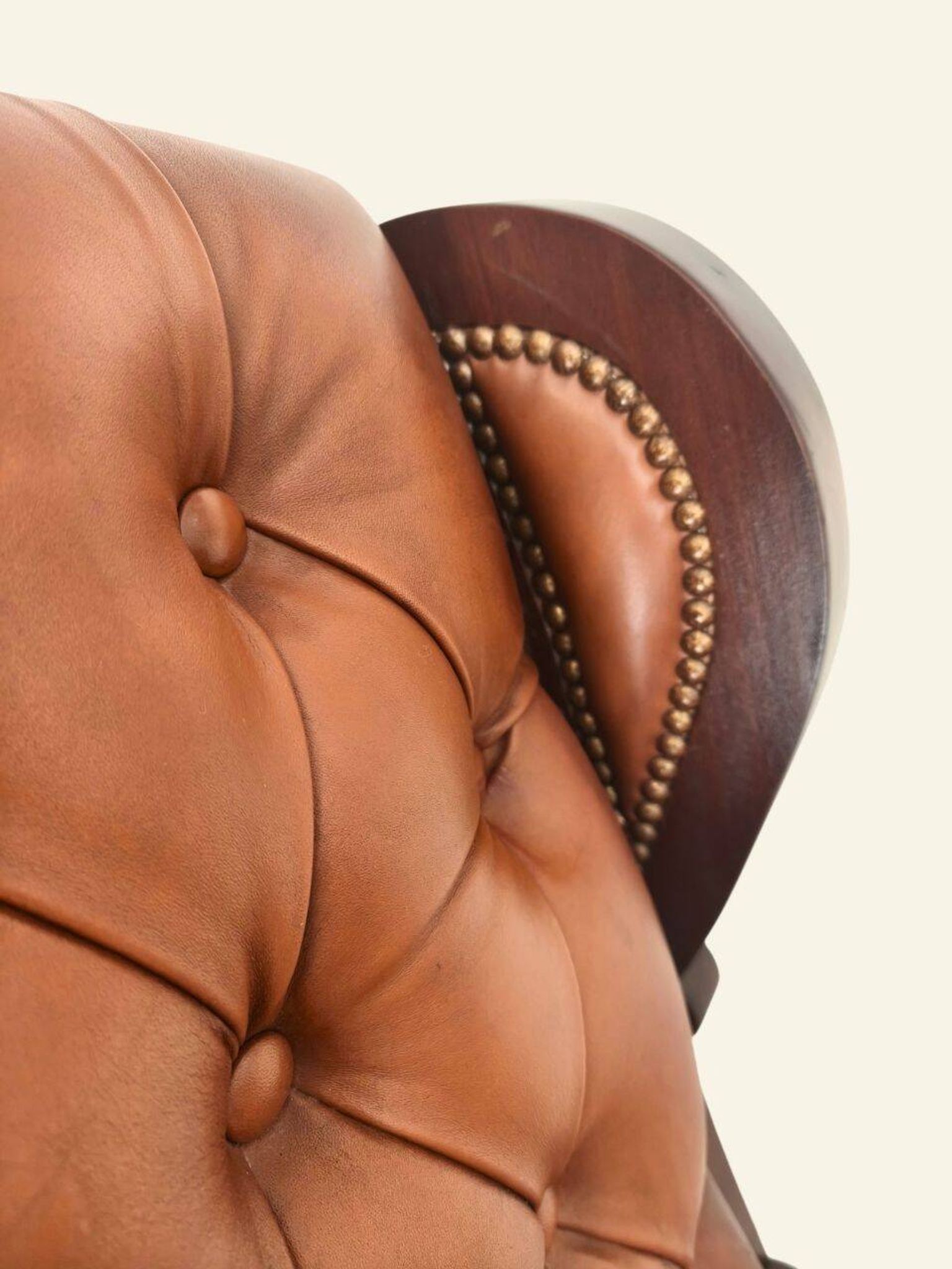Fauteuil à bascule avec repose-pieds, bois et cuir capitonné