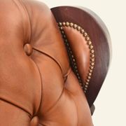 Fauteuil à bascule avec repose-pieds, bois et cuir capitonné